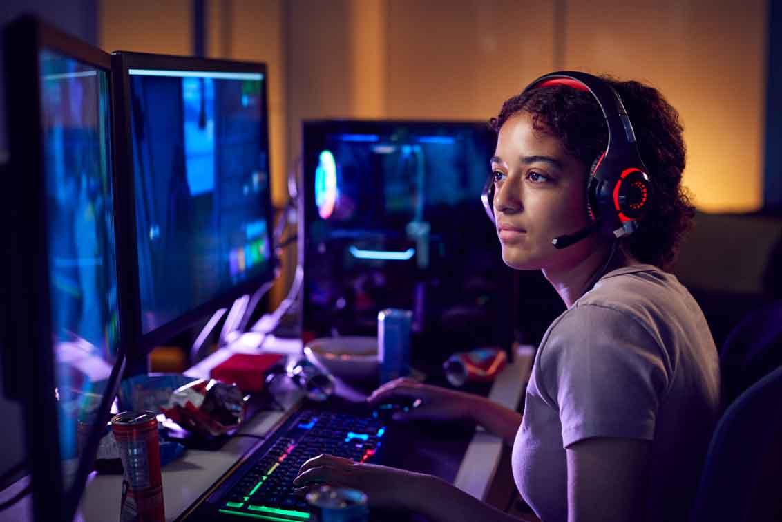 Photo of girl playing computer games