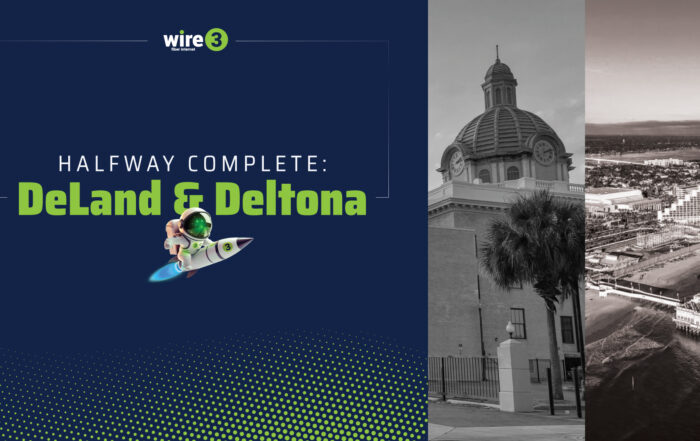 Wire 3 graphic reading "Halfway Complete: DeLand & Deltona" with a mascot astronaut riding a rocket, alongside historic DeLand and Daytona Beach imagery